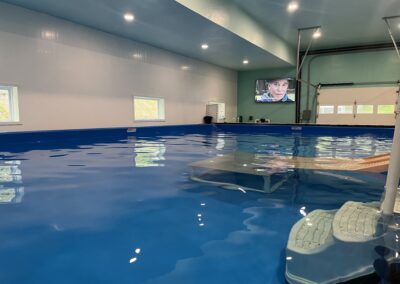 Indoor dog pool with an entry ramp at Water Bark Wellness in Union, Maine